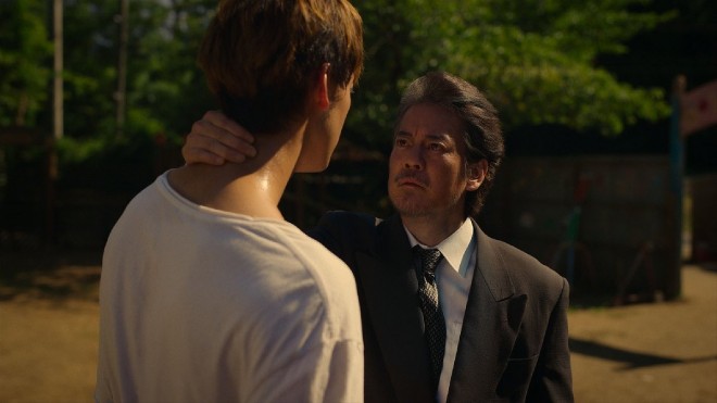 Scene still of Shintarō Kazama from "Like a Dragon: Yakuza"