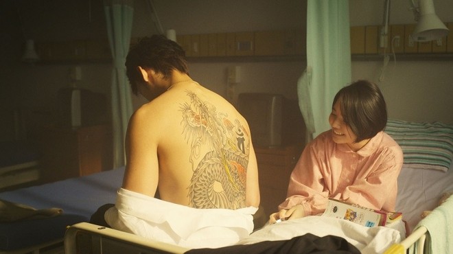 Kiryu (Ryoma Takeuchi) and Miho (Hinano Nakayama): Scene from Amazon Original drama Like a Dragon: Beyond the Game (C) 2024 Amazon Content Services LLC or its Affiliates.